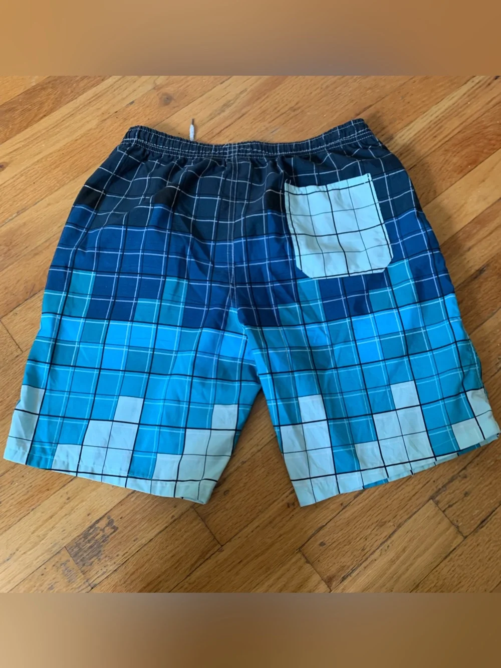 Blue and white plaid polyester swim trunks with gradient effect size XL